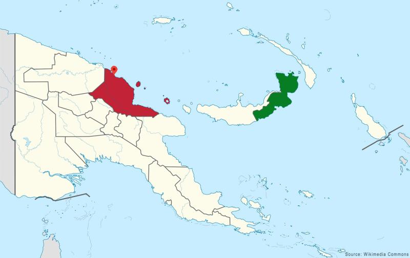 The provinces of Madang (in red) and East New Britain (in green). The marker points to Konguan.